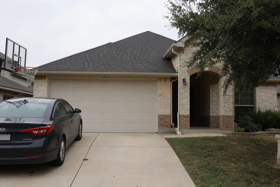 A house with an attached garage in Georgetown, TX