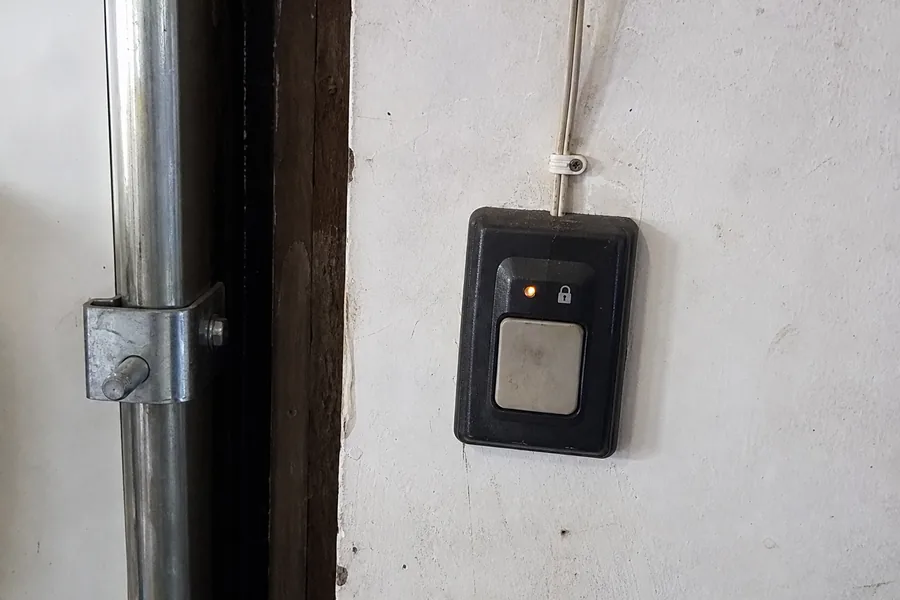 The wall control on a garage door opener in Georgetown, TX